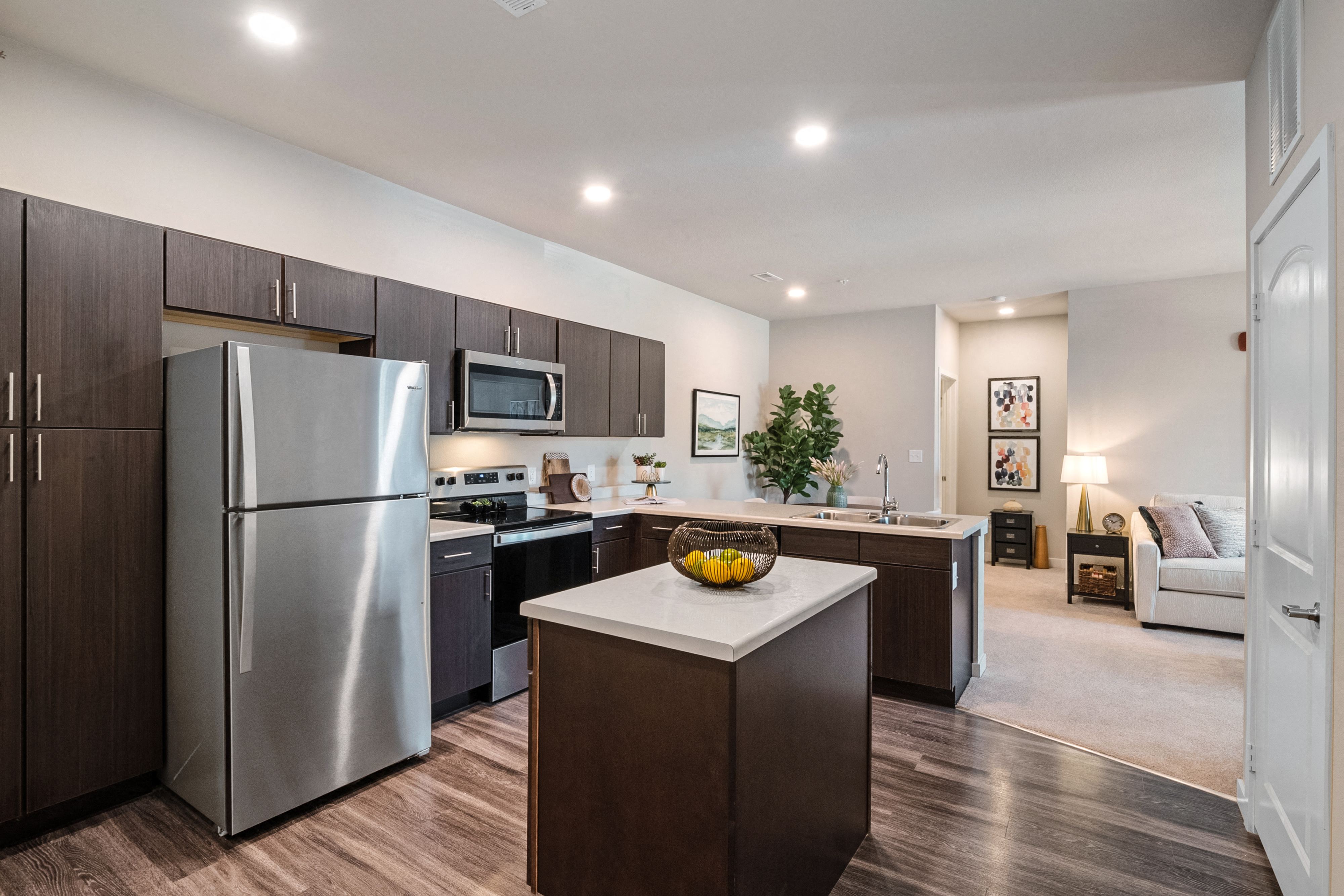 Gormet kitchen with stainless steel appliances and a island at Aventura at Wentzville, Wentzville, MO